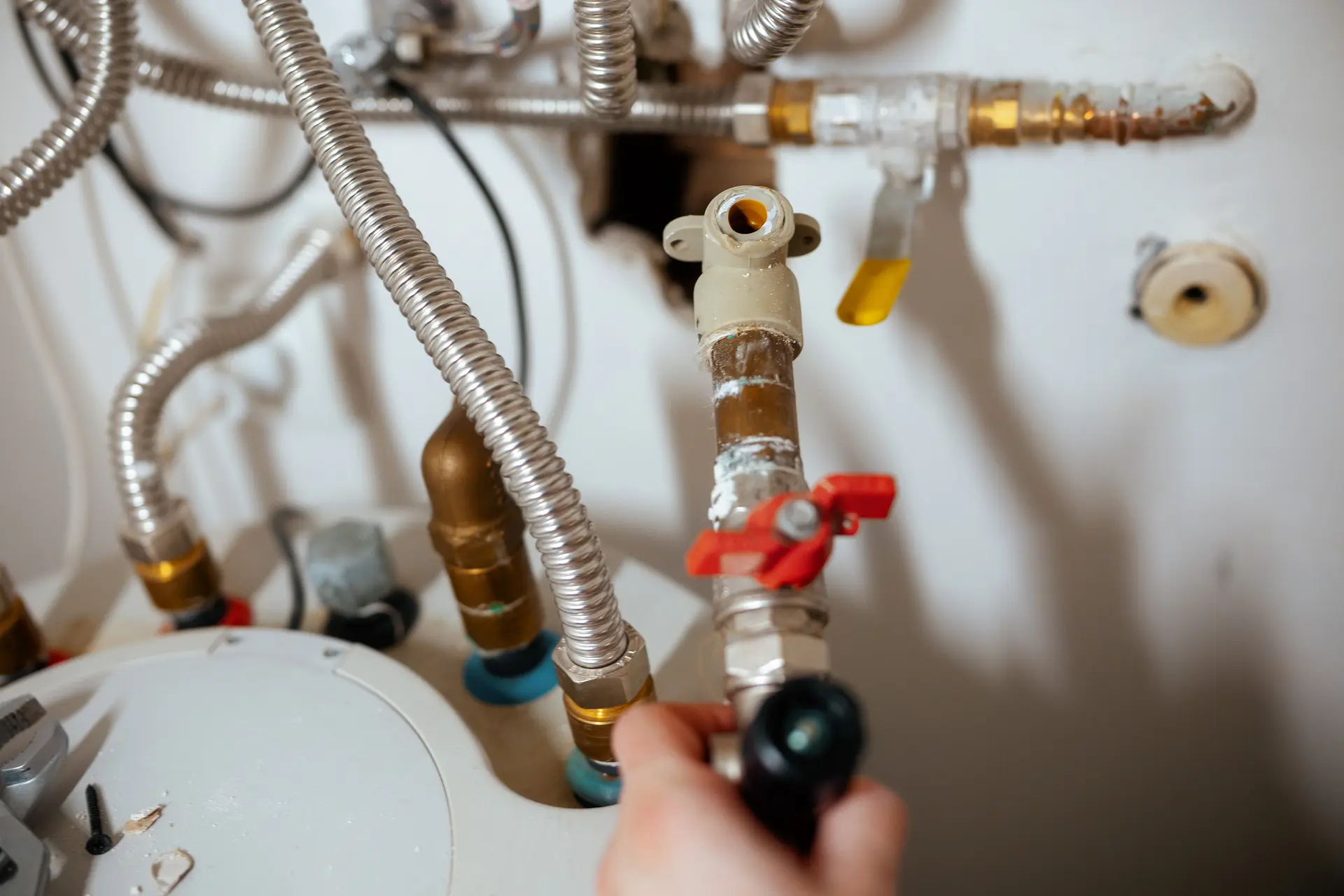 JRS Group Ltd registered gas engineer servicing a boiler in Sutton